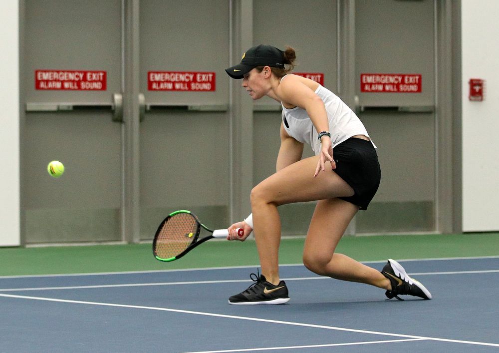 Iowa’s Elise Van Heuvelen returns a shot during her doubles match at the Hawkeye Tennis and Recreation Complex in Iowa City on Sunday, February 23, 2020. (Stephen Mally/hawkeyesports.com)