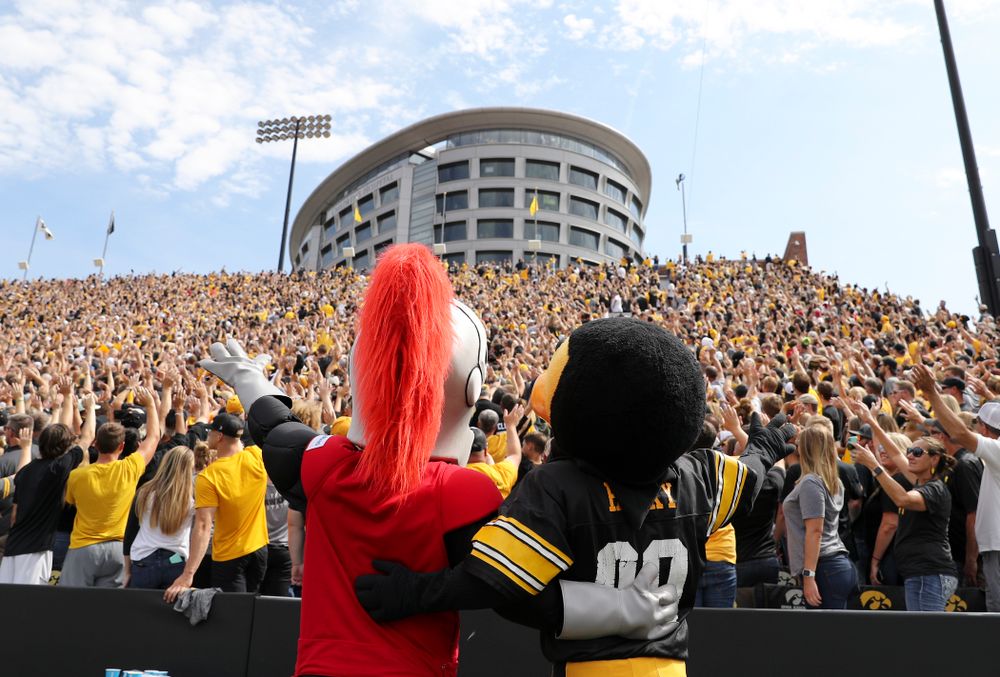Herky and Scarlet Knight wave to the University of Iowa Stead Family Children's Hospital between the first and second quarter of their Big Ten Conference football game at Kinnick Stadium in Iowa City on Saturday, Sep 7, 2019. (Stephen Mally/hawkeyesports.com)