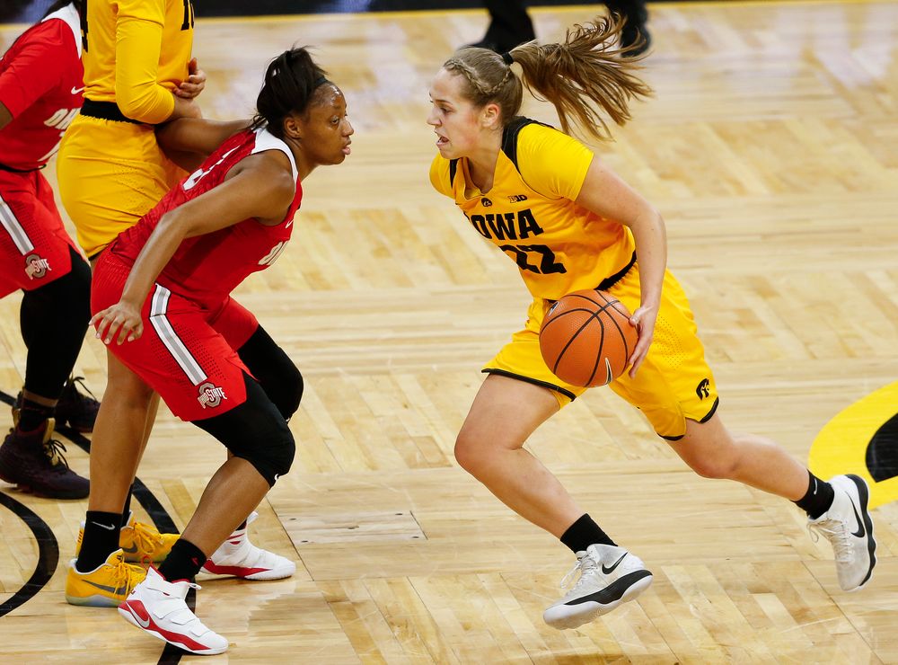 Iowa Hawkeyes guard Kathleen Doyle (22) drives the ball during a game against the Ohio State Buckeyes at Carver-Hawkeye Arena on January 25, 2018. (Tork Mason/hawkeyesports.com)