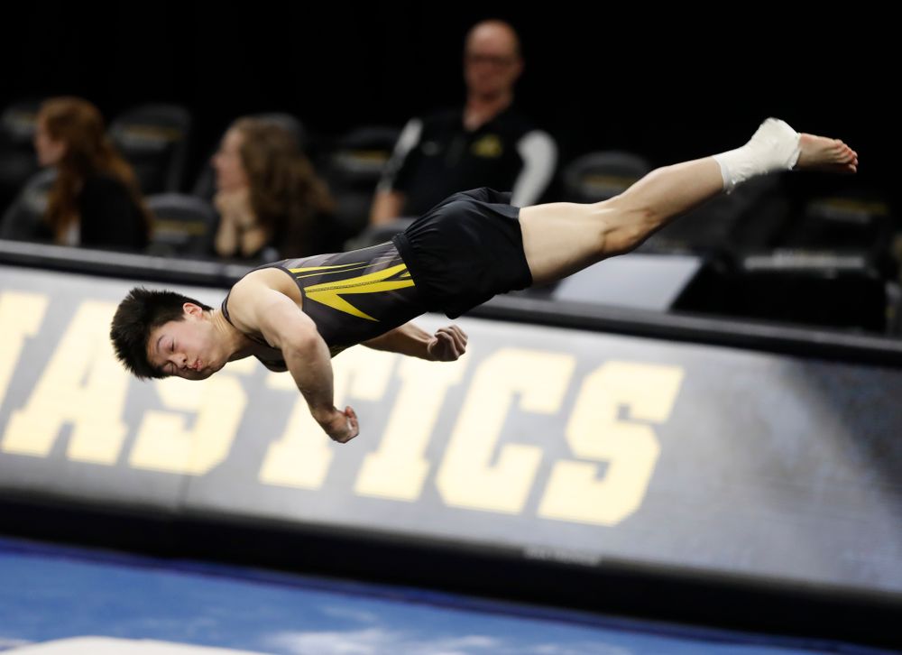 Iowa's Bennet Huang competes on the floor 