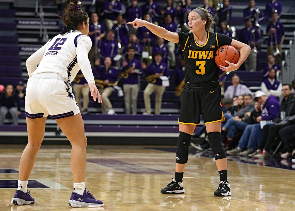 Iowa Hawkeyes guard Makenzie Meyer (3) directs traffic during the second quarter of their game at Welsh-Ryan Arena in Evanston, Ill. on Sunday, January 5, 2020. (Stephen Mally/hawkeyesports.com)