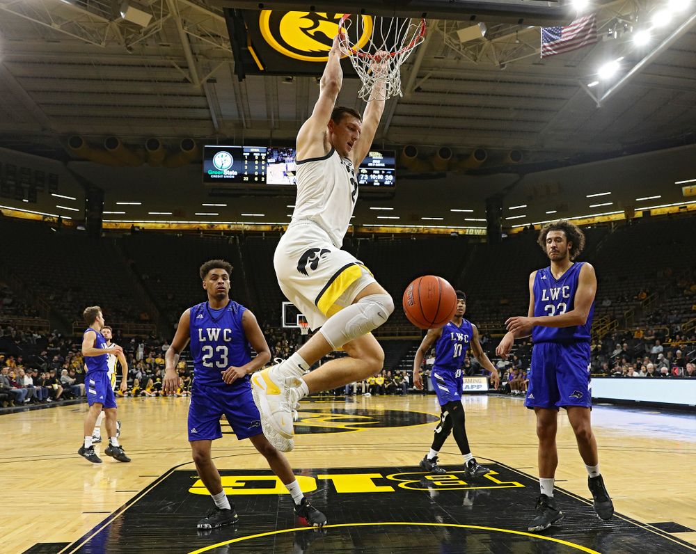 Iowa Hawkeyes forward Jack Nunge (2) dunks the ball during the second half of their exhibition game against Lindsey Wilson College at Carver-Hawkeye Arena in Iowa City on Monday, Nov 4, 2019. (Stephen Mally/hawkeyesports.com)