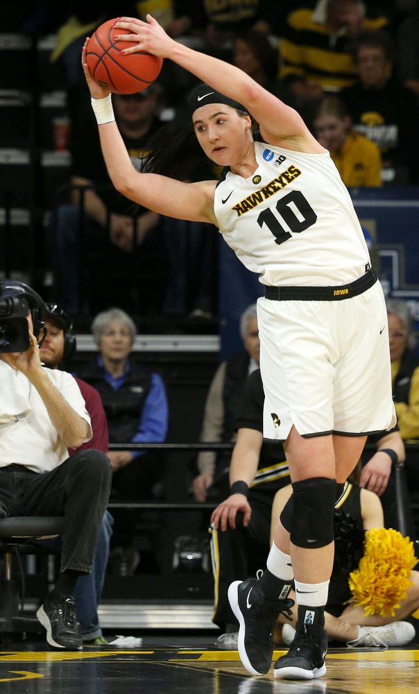 Iowa Hawkeyes forward Megan Gustafson (10) pulls in a rebound during the first round of the 2019 NCAA Women's Basketball Tournament at Carver Hawkeye Arena in Iowa City on Friday, Mar. 22, 2019. (Stephen Mally for hawkeyesports.com)