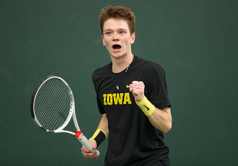 Iowa’s Jason Kerst celebrates a point during his match against Marquette at the Hawkeye Tennis and Recreation Complex in Iowa City on Saturday, January 25, 2020. (Stephen Mally/hawkeyesports.com)