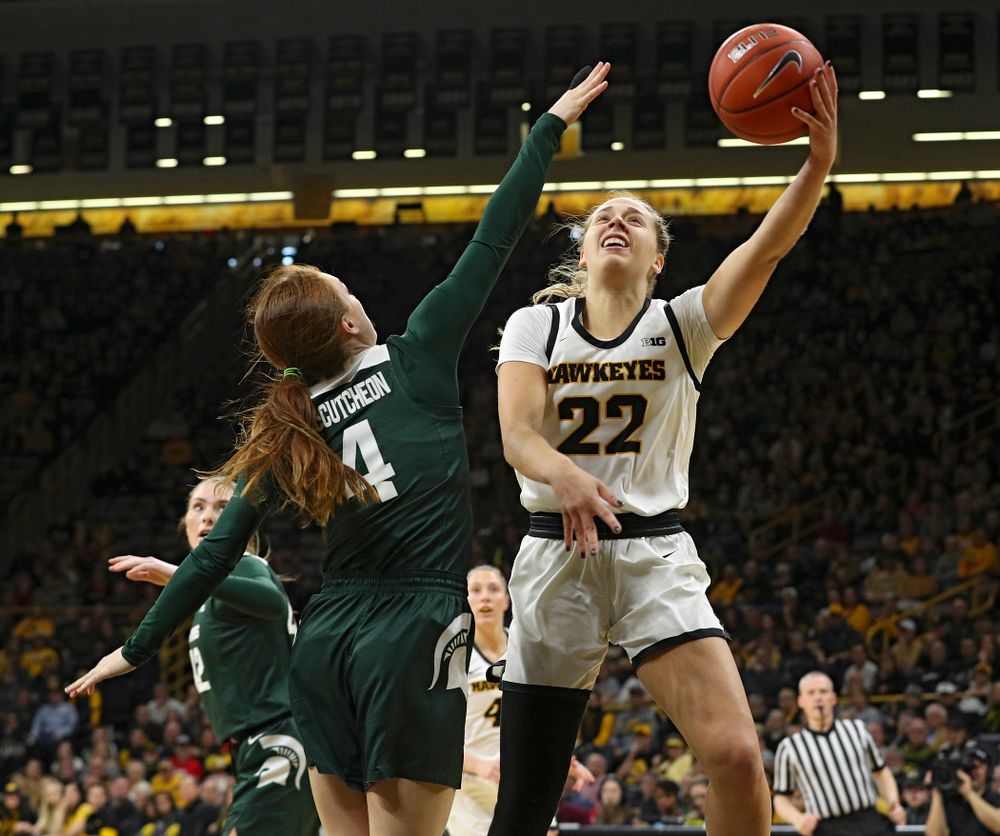Iowa Hawkeyes guard Kathleen Doyle (22) scores a basket during the first quarter of their game at Carver-Hawkeye Arena in Iowa City on Sunday, January 26, 2020. (Stephen Mally/hawkeyesports.com)