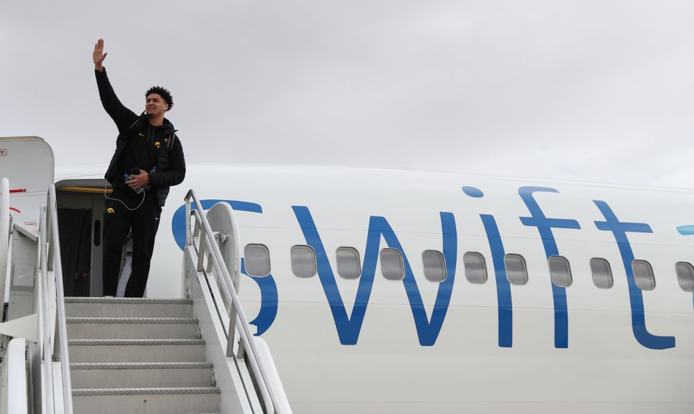 Iowa Hawkeyes forward Cordell Pemsl (35) boards a flight to Columbus for the first and second rounds of the 2019 NCAA Men's Basketball Tournament Wednesday, March 20, 2019 at the Eastern Iowa Airport. (Brian Ray/hawkeyesports.com)