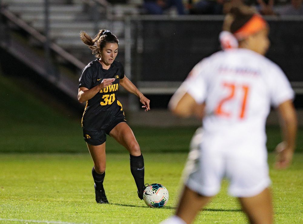 Iowa forward Devin Burns (30) settles the ball before scoring a goal during the first half of their match against Illinois at the Iowa Soccer Complex in Iowa City on Thursday, Sep 26, 2019. (Stephen Mally/hawkeyesports.com)