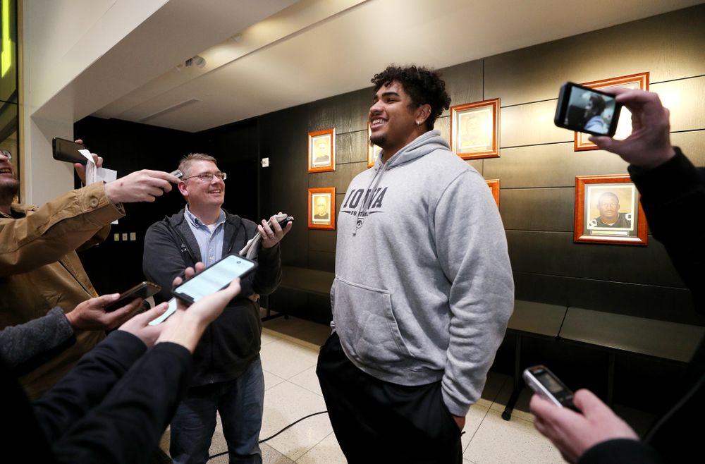 Iowa Hawkeyes offensive lineman Tristan Wirfs (74) answers questions from the media on the Hawkeyes selection to face USC in the 2019 Holiday Bowl Sunday, December 8, 2019 at the Hansen Football Performance Center. (Brian Ray/hawkeyesports.com)
