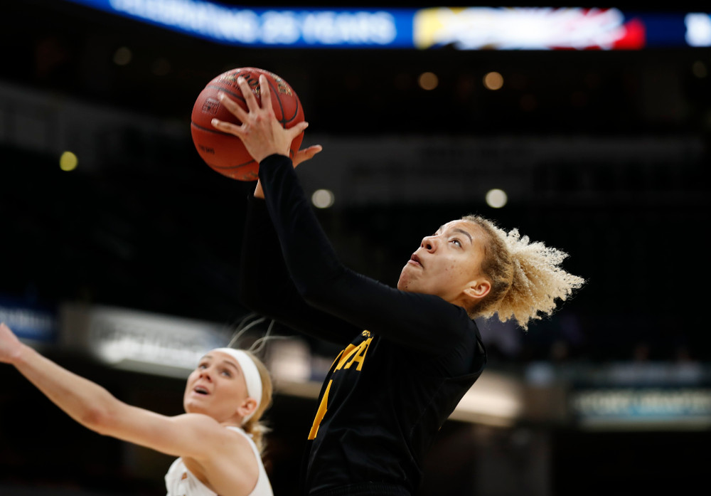 Iowa Hawkeyes forward Chase Coley (4) 