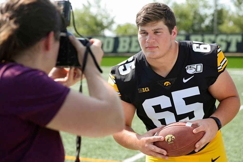 Iowa Hawkeyes offensive lineman Tyler Linderbaum (65) poses for a picture during Iowa Football Media Day at the Hansen Football Performance Center in Iowa City on Friday, Aug 9, 2019. (Stephen Mally/hawkeyesports.com)