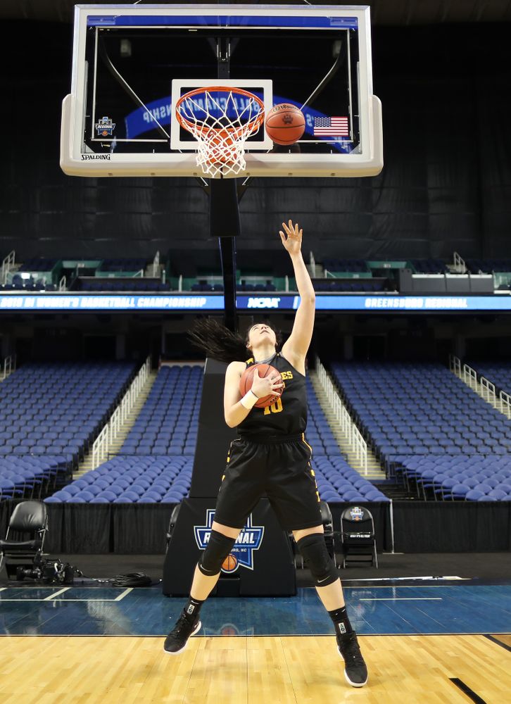 Iowa Hawkeyes forward Megan Gustafson (10) does the reverse Mikan Drill the ESPN Crew following practice for their Sweet 16 matchup against NC State Friday, March 29, 2019 at the Greensboro Coliseum in Greensboro, NC.(Brian Ray/hawkeyesports.com)