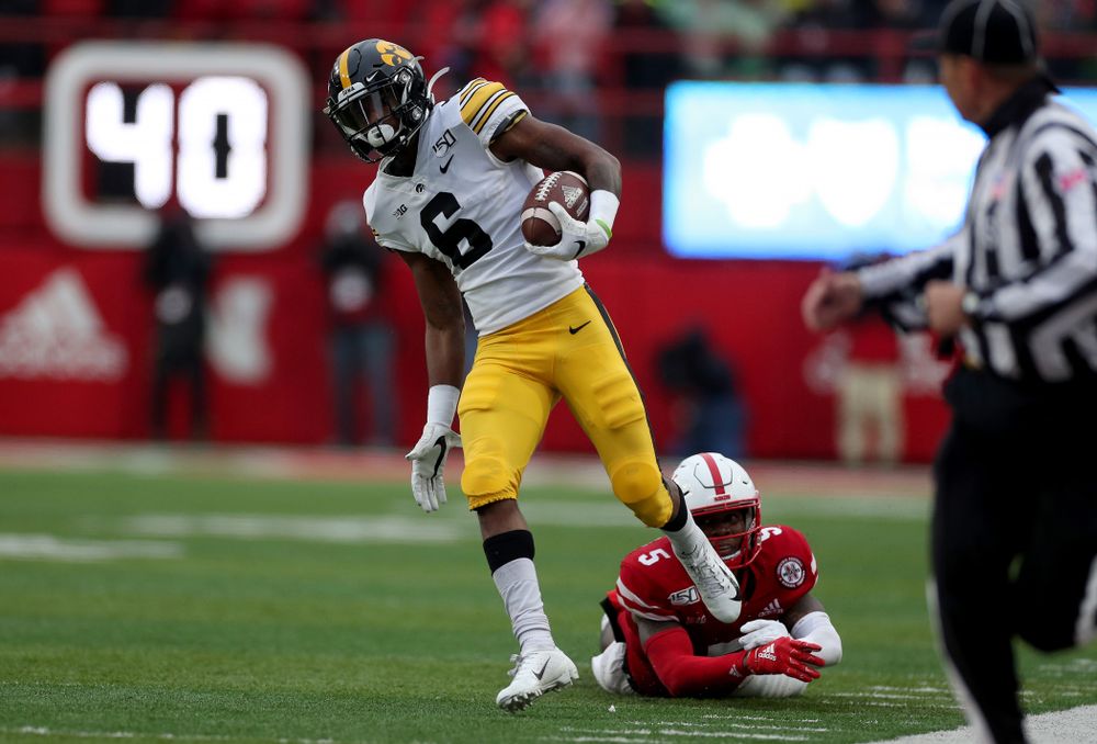 Iowa Hawkeyes wide receiver Ihmir Smith-Marsette (6) returns a kickoff for a touchdown against the Nebraska Cornhuskers Friday, November 29, 2019 at Memorial Stadium in Lincoln, Neb. (Brian Ray/hawkeyesports.com)