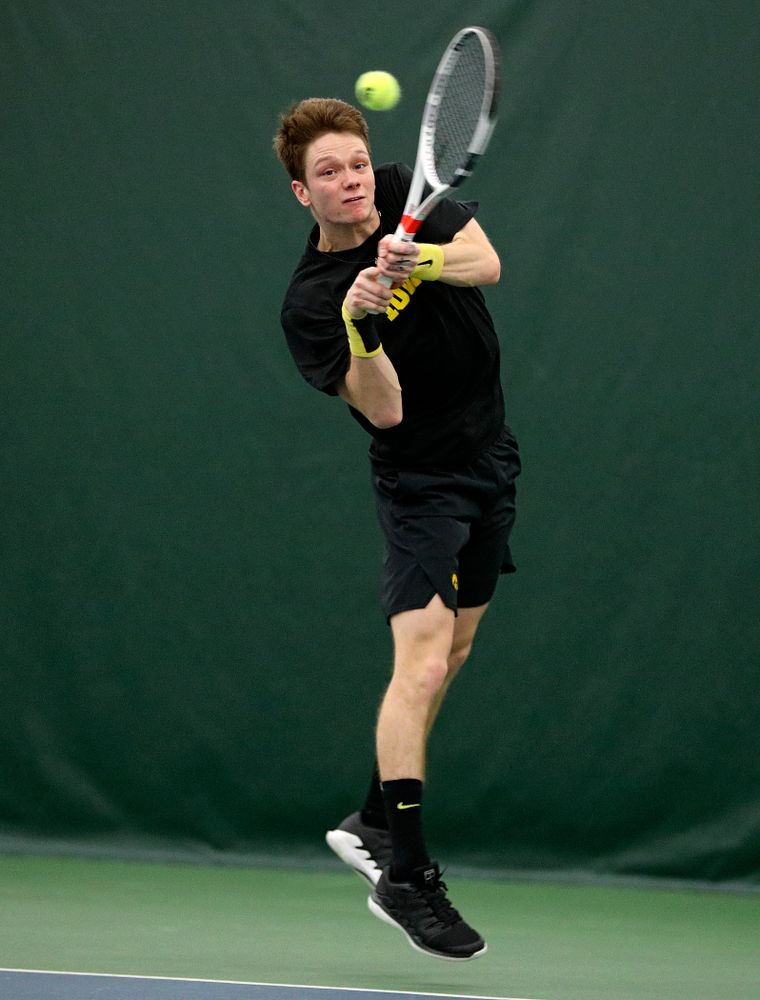 Iowa’s Jason Kerst returns a shot during his singles match at the Hawkeye Tennis and Recreation Complex in Iowa City on Friday, March 6, 2020. (Stephen Mally/hawkeyesports.com)