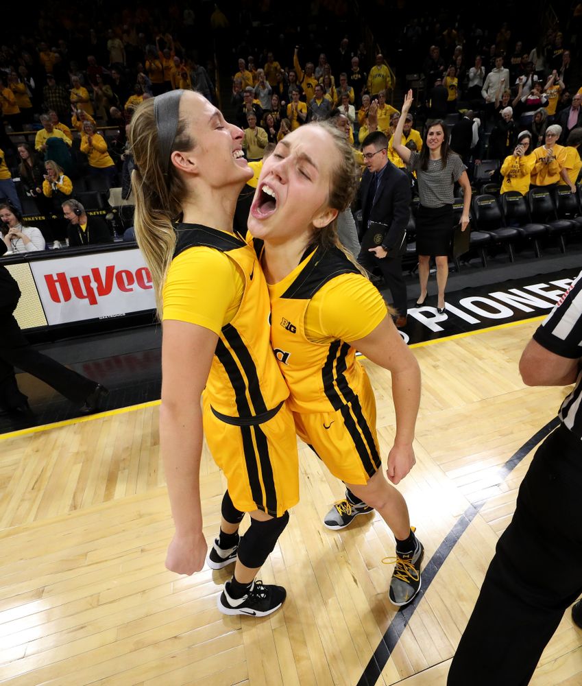Iowa Hawkeyes guard Kathleen Doyle (22) celebrates with guard Makenzie Meyer (3) following their victory against the Maryland Terrapins Thursday, January 9, 2020 at Carver-Hawkeye Arena. (Brian Ray/hawkeyesports.com)