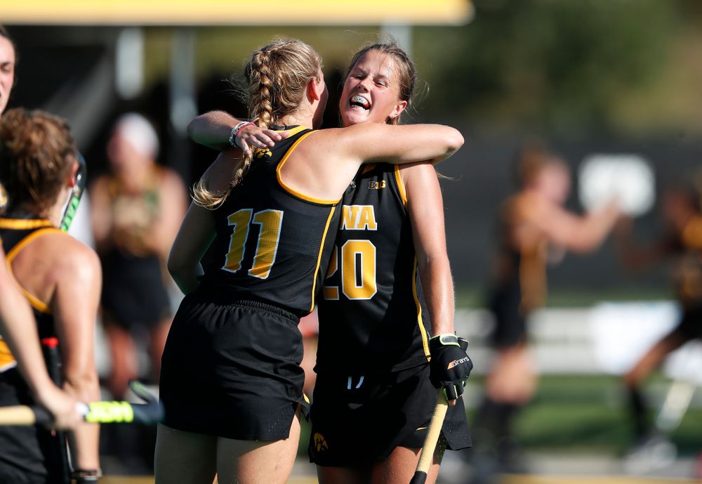 Iowa Hawkeyes Katie Birch (11) hugs Sophie Sunderland (20) after scoring against the Penn Quakers Friday, September 14, 2018 at Grant Field. (Brian Ray/hawkeyesports.com)