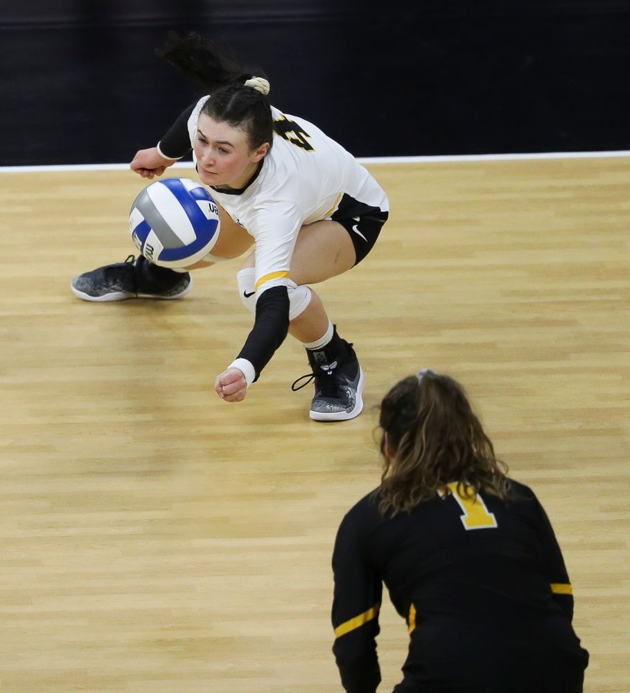 Iowa Hawkeyes defensive specialist Halle Johnston (4) digs the ball during a match against Penn State at Carver-Hawkeye Arena on November 3, 2018. (Tork Mason/hawkeyesports.com)