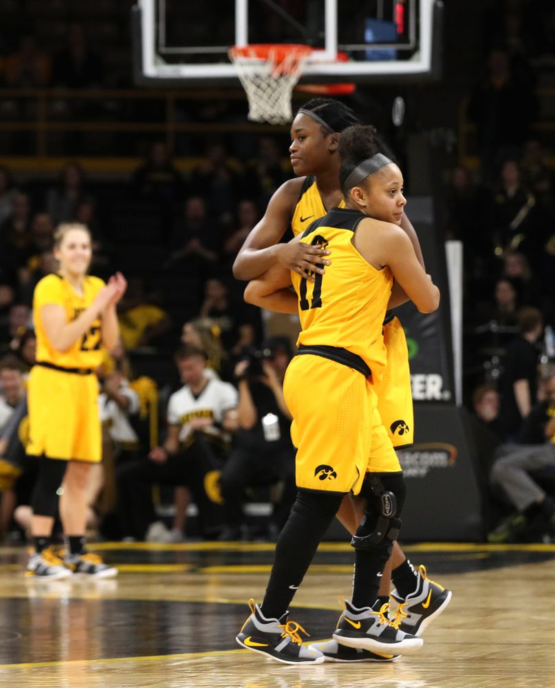 Iowa Hawkeyes guard Tania Davis (11) and guard Tomi Taiwo (1) against the Northwestern Wildcats Sunday, March 3, 2019 at Carver-Hawkeye Arena. (Brian Ray/hawkeyesports.com)