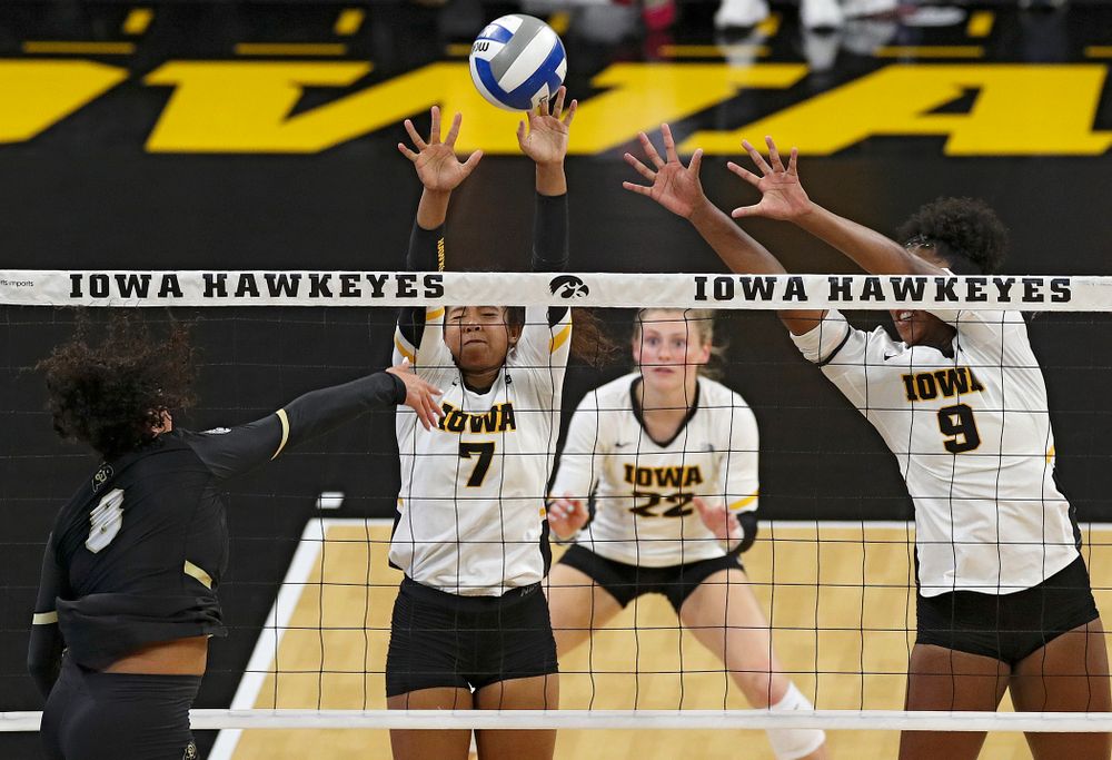 Iowa’s Brie Orr (7) gets her fingers on a shot as Jaedynn Evans (22) and Amiya Jones (9) look on during the second set of their Big Ten/Pac-12 Challenge match against Colorado at Carver-Hawkeye Arena in Iowa City on Friday, Sep 6, 2019. (Stephen Mally/hawkeyesports.com)