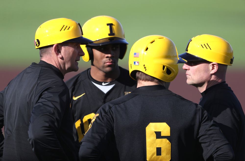 Iowa Hawkeyes Head Coach Rick Heller and assistant coach Robin Lund against California State Northridge Sunday, March 17, 2019 at Duane Banks Field. (Brian Ray/hawkeyesports.com)