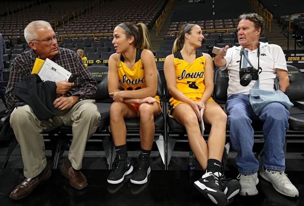 Iowa guard Megan Meyer (11) and guard Makenzie Meyer (3) answer questions during Iowa Women’s Basketball Media Day at Carver-Hawkeye Arena in Iowa City on Thursday, Oct 24, 2019. (Stephen Mally/hawkeyesports.com)