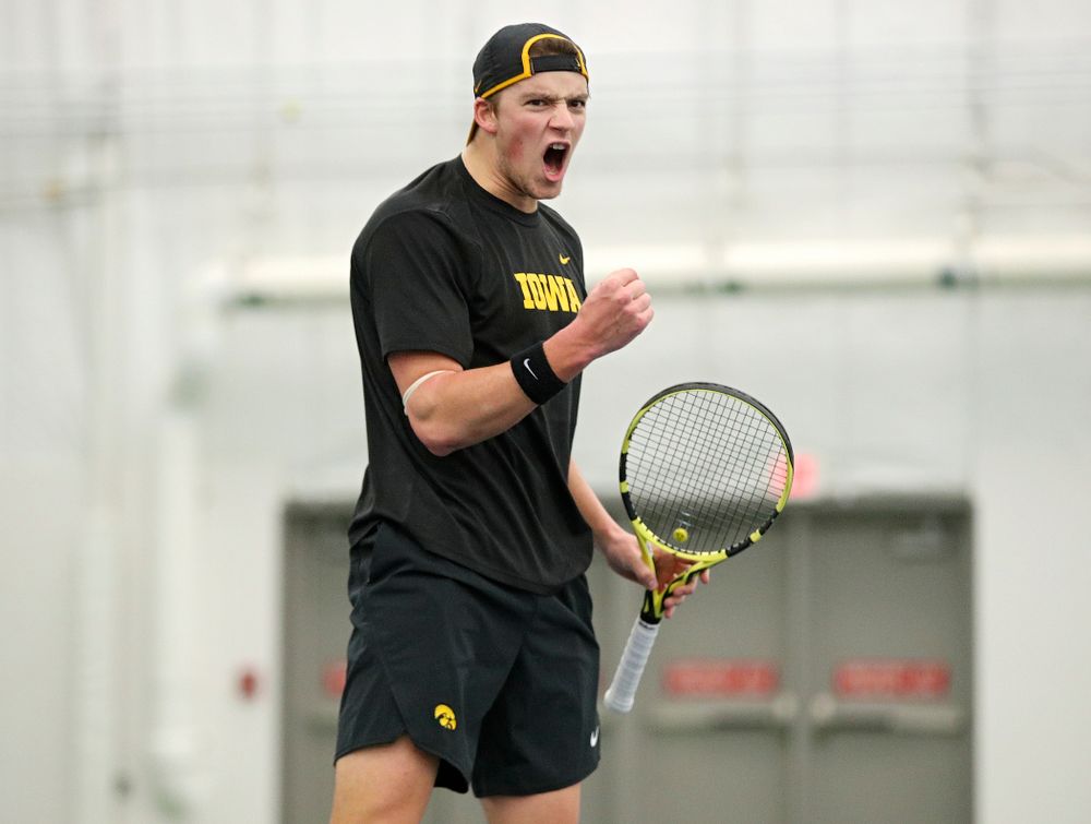 Iowa’s Joe Tyler celebrates a point during his match against Marquette at the Hawkeye Tennis and Recreation Complex in Iowa City on Saturday, January 25, 2020. (Stephen Mally/hawkeyesports.com)