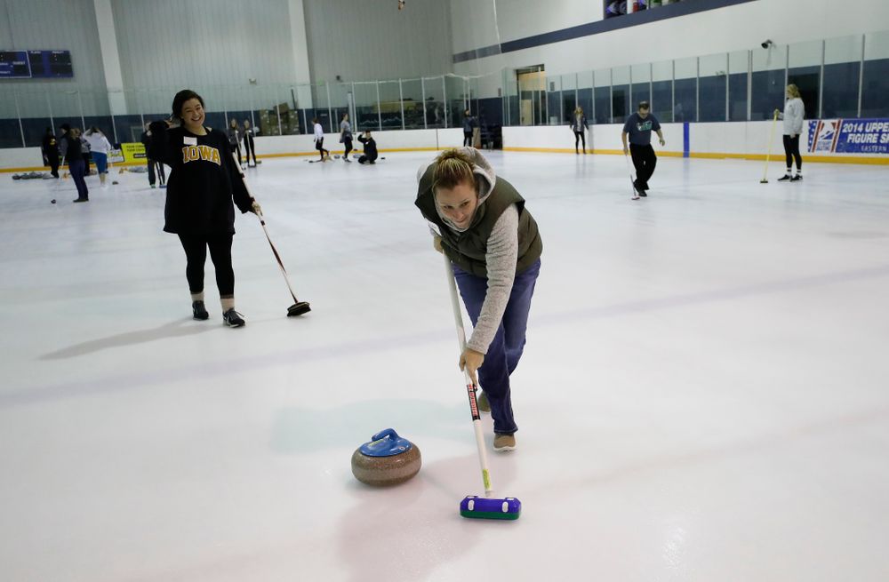 Members of the Iowa Softball team learn the sport of curling as part of a team building event Wednesday, January 10, 2018 at the Cedar Rapids Ice Arena. (Brian Ray/hawkeyesports.com)