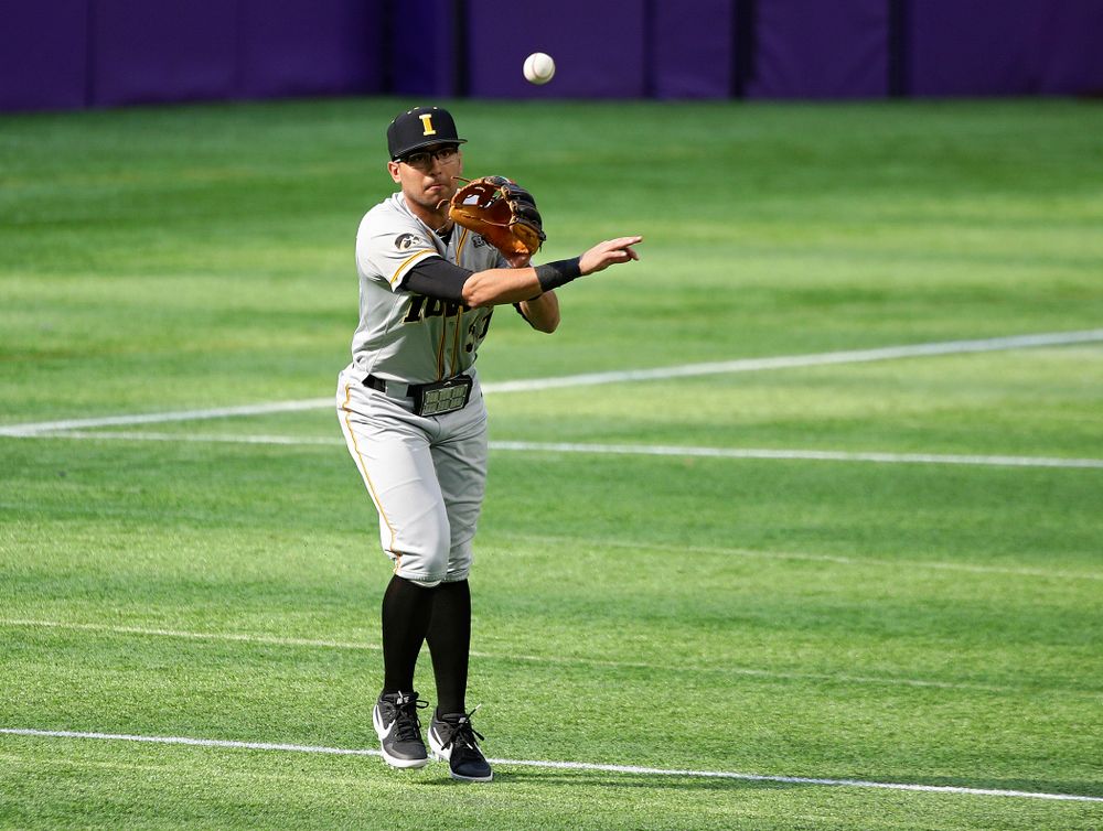 Iowa Hawkeyes infielder Matthew Sosa (31) throws to first during the third inning of their CambriaCollegeClassic game at U.S. Bank Stadium in Minneapolis, Minn. on Friday, February 28, 2020. (Stephen Mally/hawkeyesports.com)