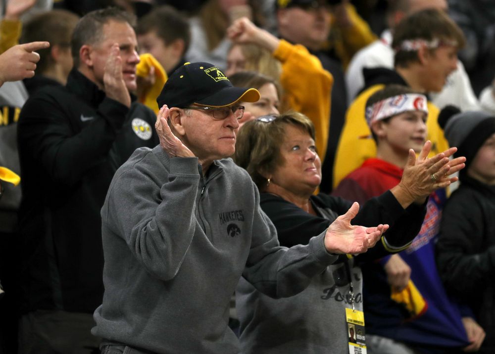 Former Head Coach Dan Gable claps as Iowa’s Michael Kemerer wrestles Penn State’s Mark Hall at 174 pounds Friday, January 31, 2020 at Carver-Hawkeye Arena. Kemerer won the match 11-6. (Brian Ray/hawkeyesports.com)