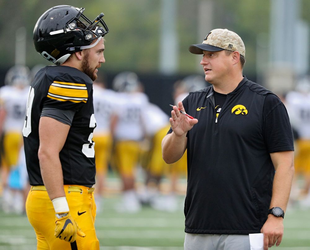 Iowa Hawkeyes tight end Nate Wieting (39) talks with offensive coordinator Brian Ferentz  durning Fall Camp Practice No. 17 at the Hansen Football Performance Center in Iowa City on Wednesday, Aug 21, 2019. (Stephen Mally/hawkeyesports.com)