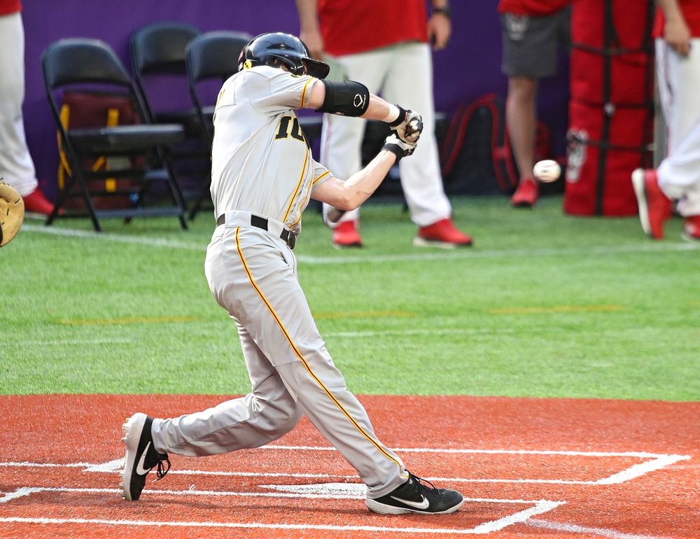 Iowa Hawkeyes outfielder Ben Norman (9) gets a hit during the seventh inning of their CambriaCollegeClassic game at U.S. Bank Stadium in Minneapolis, Minn. on Friday, February 28, 2020. (Stephen Mally/hawkeyesports.com)
