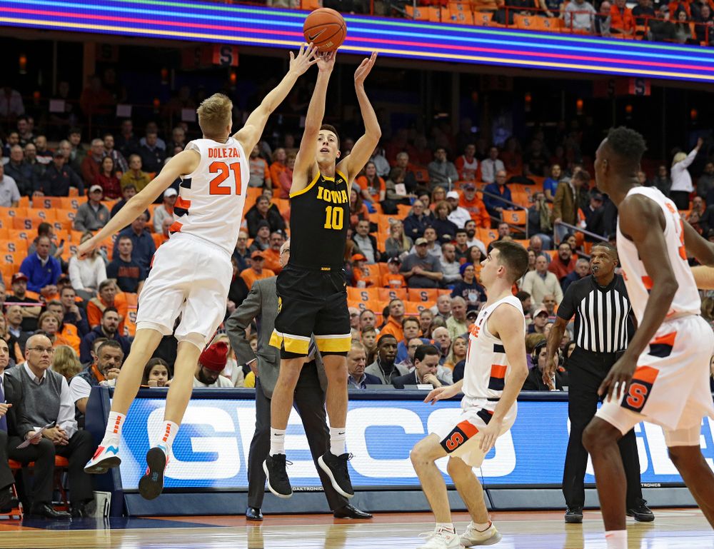Iowa Hawkeyes guard Joe Wieskamp (10) makes a 3-pointer during the first half of their ACC/Big Ten Challenge game at the Carrier Dome in Syracuse, N.Y. on Tuesday, Dec 3, 2019. (Stephen Mally/hawkeyesports.com)