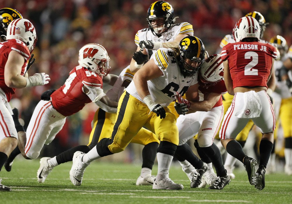 Iowa Hawkeyes offensive lineman Kyler Schott (64) against the Wisconsin Badgers Saturday, November 9, 2019 at Camp Randall Stadium in Madison, Wisc. (Brian Ray/hawkeyesports.com)