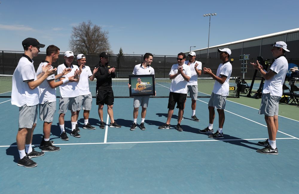 IowaÕs Jonas Larsen is honored during senior day ceremonies before their game against the Michigan Wolverines Sunday, April 21, 2019 at the Hawkeye Tennis and Recreation Complex. (Brian Ray/hawkeyesports.com)