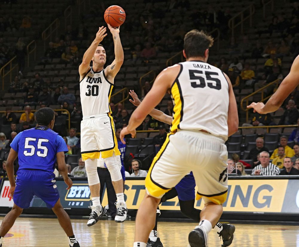Iowa Hawkeyes guard Connor McCaffery (30) makes a 3-pointer during the second half of their exhibition game against Lindsey Wilson College at Carver-Hawkeye Arena in Iowa City on Monday, Nov 4, 2019. (Stephen Mally/hawkeyesports.com)