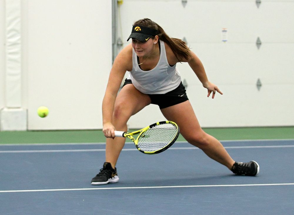 Iowa’s Danielle Bauers returns a shot during her doubles match at the Hawkeye Tennis and Recreation Complex in Iowa City on Sunday, February 23, 2020. (Stephen Mally/hawkeyesports.com)