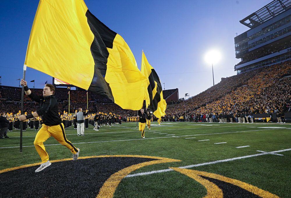 The Hawkeyes swarm as they take the field before their game at Kinnick Stadium in Iowa City on Saturday, Oct 12, 2019. (Stephen Mally/hawkeyesports.com)