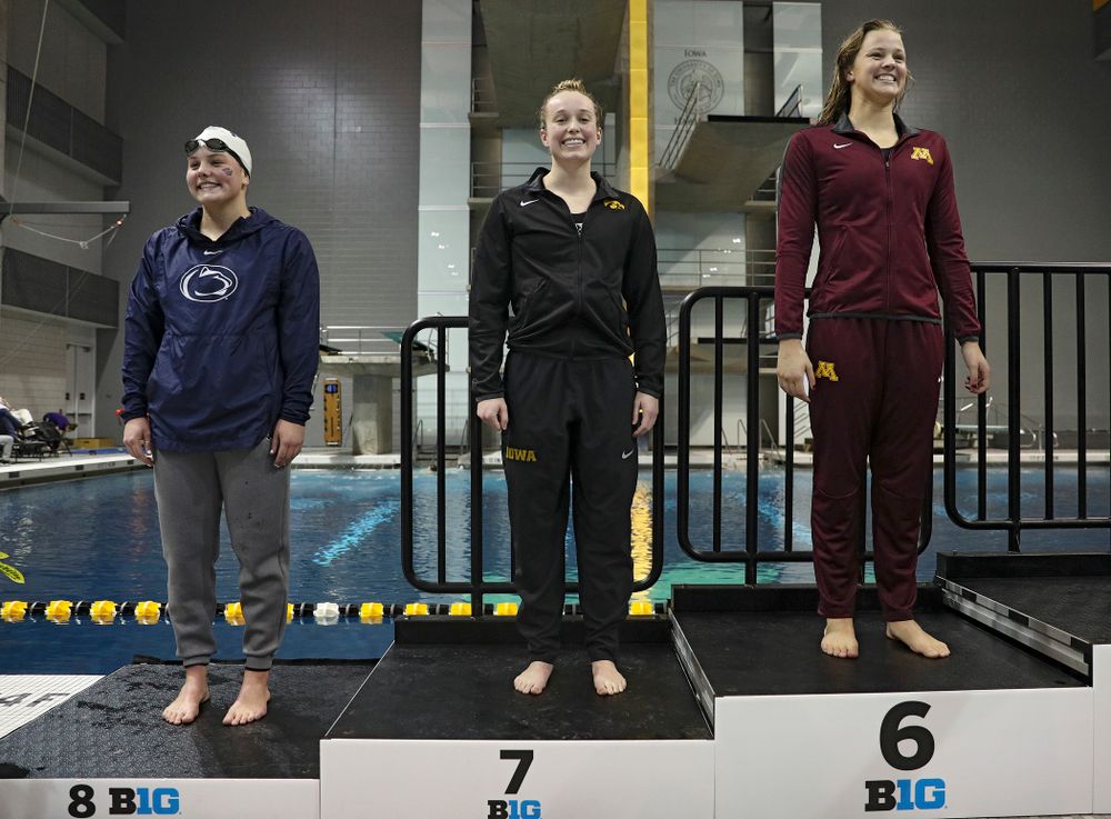 Iowa’s Kelsey Drake on the awards stand after swimming the women’s 100 yard butterfly final event during the 2020 Women’s Big Ten Swimming and Diving Championships at the Campus Recreation and Wellness Center in Iowa City on Friday, February 21, 2020. (Stephen Mally/hawkeyesports.com)