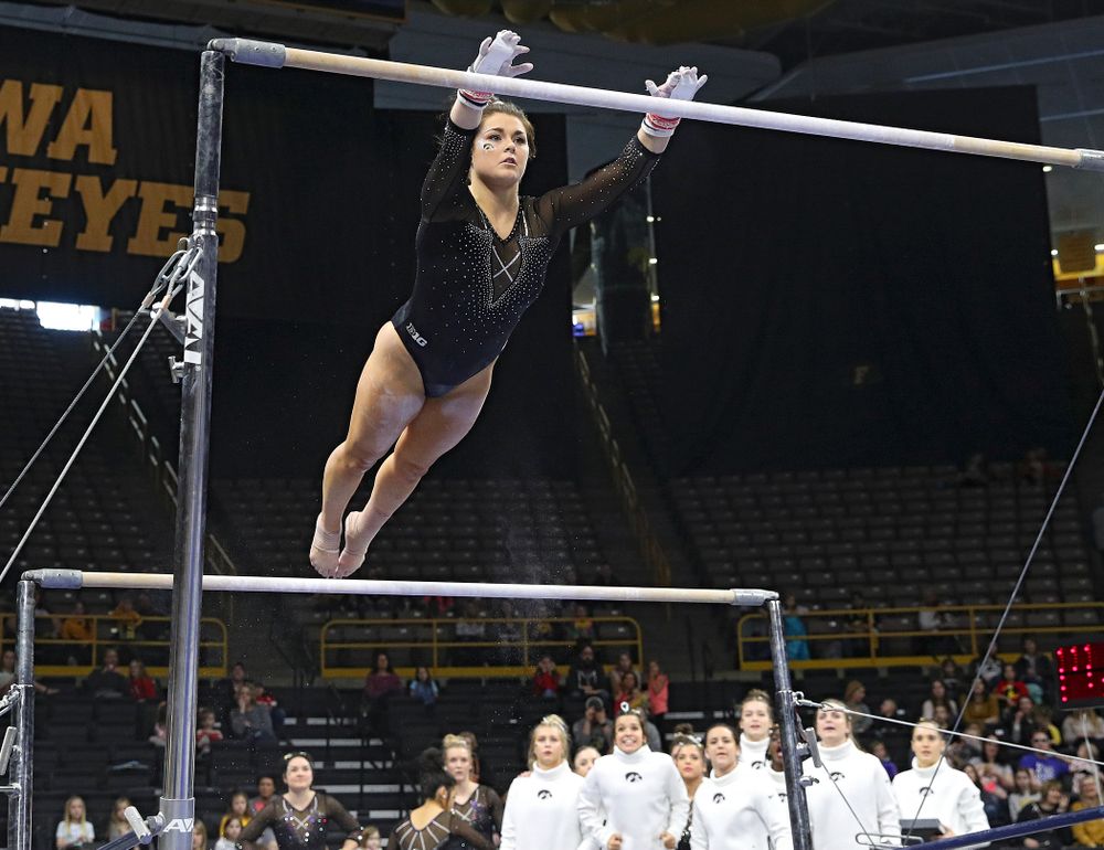 Iowa’s Erin Castle competes on the bars during their meet at Carver-Hawkeye Arena in Iowa City on Sunday, March 8, 2020. (Stephen Mally/hawkeyesports.com)