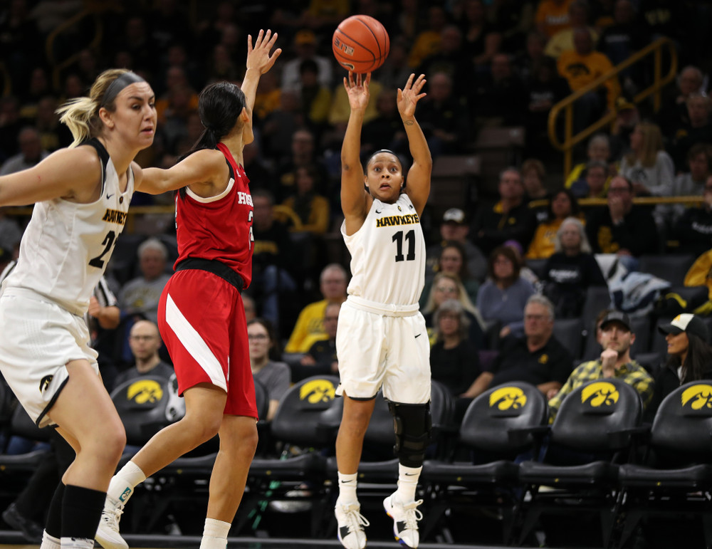 Iowa Hawkeyes guard Tania Davis (11) knocks down a three point basket against the Nebraska Cornhuskers Thursday, January 3, 2019 at Carver-Hawkeye Arena. (Brian Ray/hawkeyesports.com)