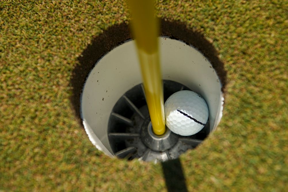 The ball Iowa's Matthew Walker used for his hole-in-one on the fourth hole sits in the cup after the third round of the Hawkeye Invitational at Finkbine Golf Course in Iowa City on Sunday, Apr. 21, 2019. (Stephen Mally/hawkeyesports.com)