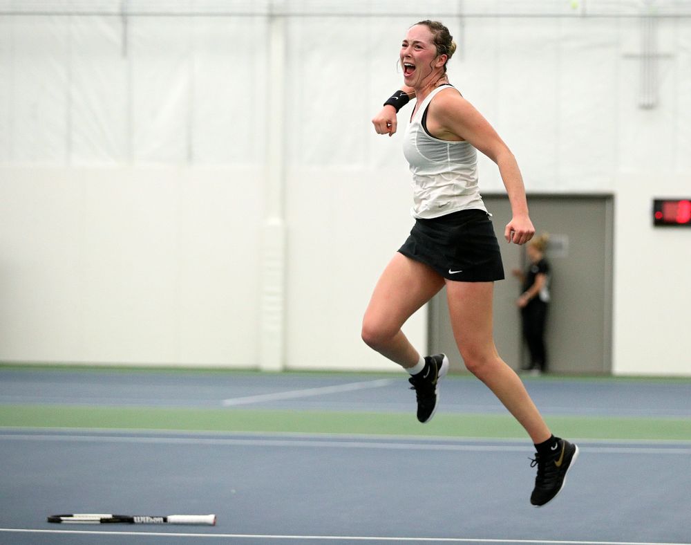 Iowa’s Samantha Mannix celebrates after winning her singles match at the Hawkeye Tennis and Recreation Complex in Iowa City on Sunday, February 23, 2020. (Stephen Mally/hawkeyesports.com)