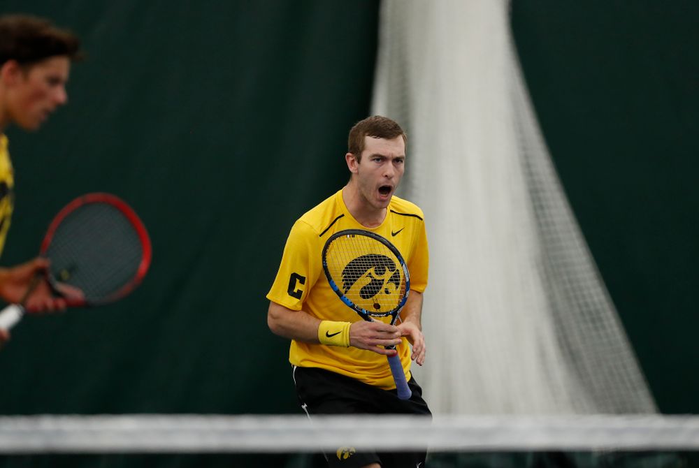 Joe Tyler and Jake Jacoby play a doubles match against the Illinois Fighting Illini Saturday, March 31, 2018 at Hawkeye Tennis and Recreation Center. (Brian Ray/hawkeyesports.com)