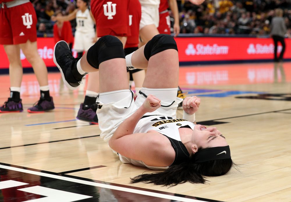 Iowa Hawkeyes forward Megan Gustafson (10) celebrates after making a basket and drawing a foul against the Indiana Hoosiers in the quarterfinals of the Big Ten Tournament Friday, March 8, 2019 at Bankers Life Fieldhouse in Indianapolis, Ind. (Brian Ray/hawkeyesports.com)