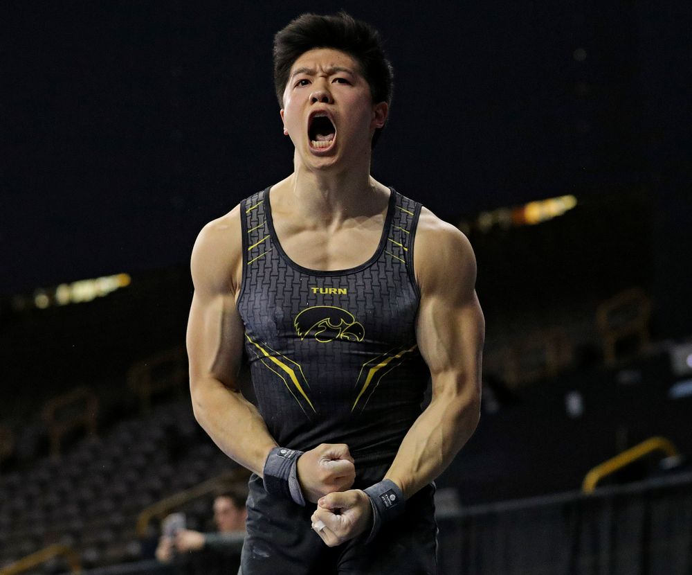 Iowa's Bennet Huang celebrates after competing in the pommel during the first day of the Big Ten Men's Gymnastics Championships at Carver-Hawkeye Arena in Iowa City on Friday, Apr. 5, 2019. (Stephen Mally/hawkeyesports.com)