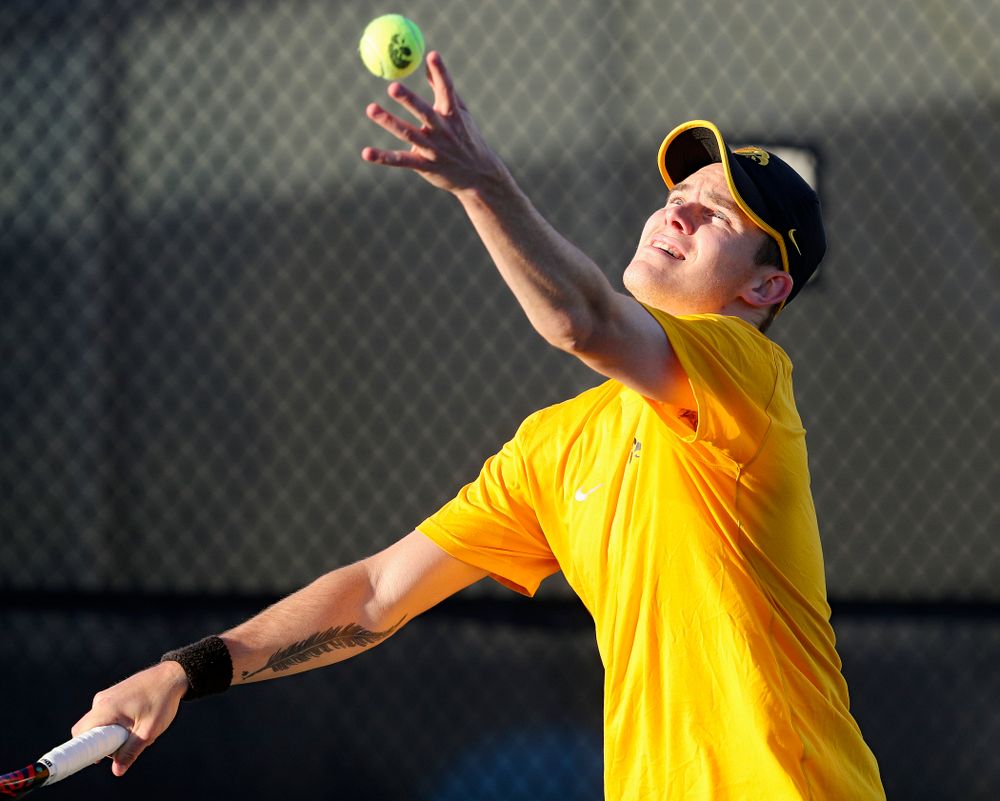 Iowa's Jonas Larsen serves during his match again Michigan State at the Hawkeye Tennis and Recreation Complex in Iowa City on Friday, Apr. 19, 2019. (Stephen Mally/hawkeyesports.com)
