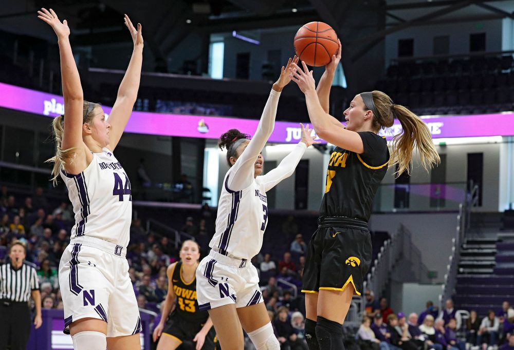 Iowa Hawkeyes guard Makenzie Meyer (3) passes the ball during the third quarter of their game at Welsh-Ryan Arena in Evanston, Ill. on Sunday, January 5, 2020. (Stephen Mally/hawkeyesports.com)