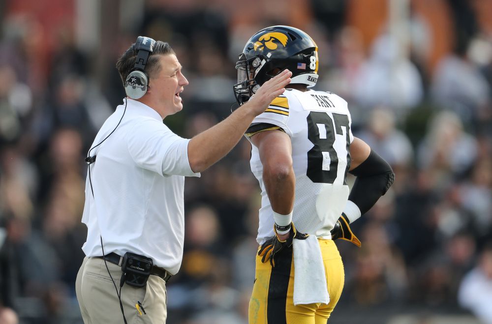 Iowa Hawkeyes offensive coordinator Brian Ferentz talks with tight end Noah Fant (87) during their game against the Purdue Boilermakers Saturday, November 3, 2018 Ross Ade Stadium in West Lafayette, Ind. (Brian Ray/hawkeyesports.com)