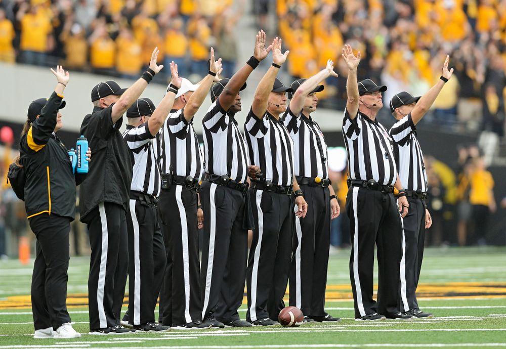 Officials wave to the University of Iowa Stead Family Children's Hospital between the first and second quarter of their game at Kinnick Stadium in Iowa City on Saturday, Sep 28, 2019. (Stephen Mally/hawkeyesports.com)