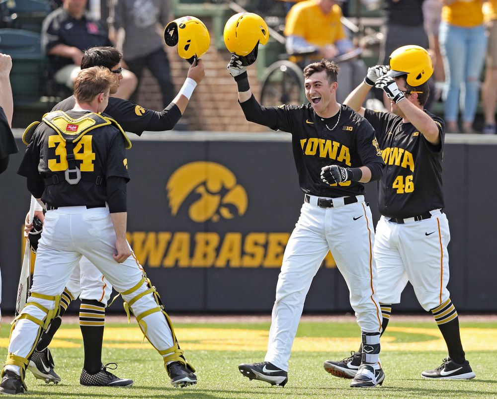 Iowa Hawkeyes shortstop Tanner Wetrich (16) celebrates after hitting a solo home run during the second inning of their game against Rutgers at Duane Banks Field in Iowa City on Saturday, Apr. 6, 2019. (Stephen Mally/hawkeyesports.com)