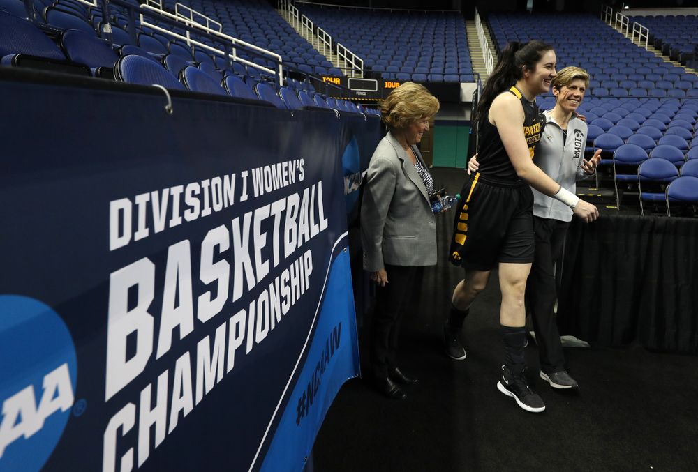 Iowa Hawkeyes forward Megan Gustafson (10) and associate head coach Jan Jensen during media and practice as they prepare for their Sweet 16 matchup against NC State Friday, March 29, 2019 at the Greensboro Coliseum in Greensboro, NC.(Brian Ray/hawkeyesports.com)